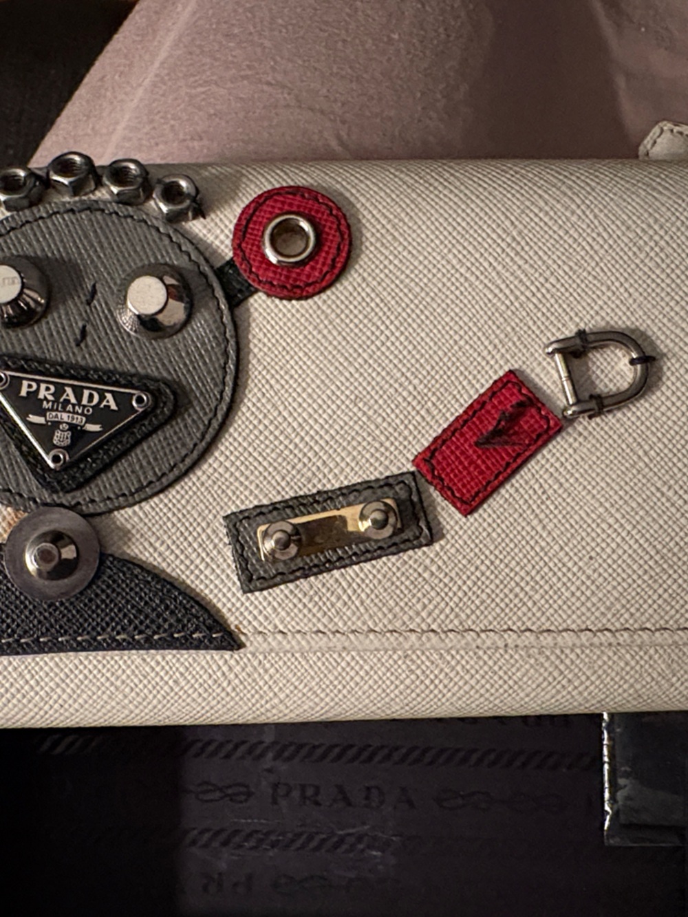 Prada White Saffiano Leather Wallet with Red and Black Robot Accent and Hardware